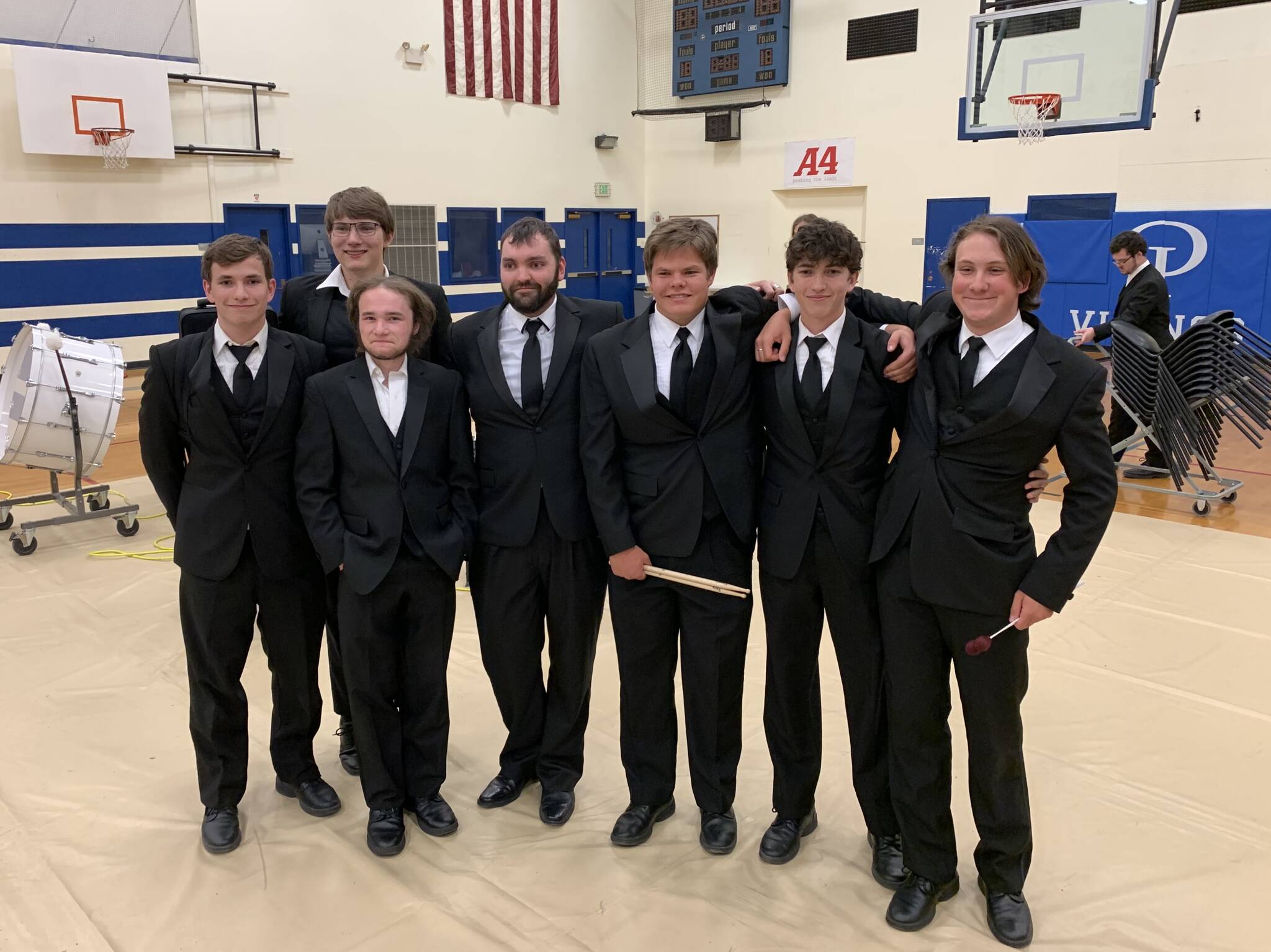 From left: Ryan Krisch-Derr, Paxton White, Quin Wildman-Gossett, OIHS Band Director Darren Dix, Logan Jones, Justin Krisch-Derr and Finn Rubottom. Not pictured: Elijah Giampietro.