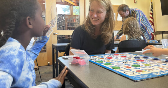 Colleen Smith Summers photo.
Left to right: Edela Fleming, Pepper Binkley and Woody Ciskowski at a recent game night at the Orcas Library.