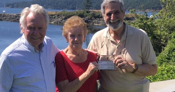 Contributed photo.
L-R: Gill Blinn, pilot in the program, Jan Cleveland, American Legion Auxiliary Chaplain and Jack Becker, Treasurer of the Orcas Aviation Association.