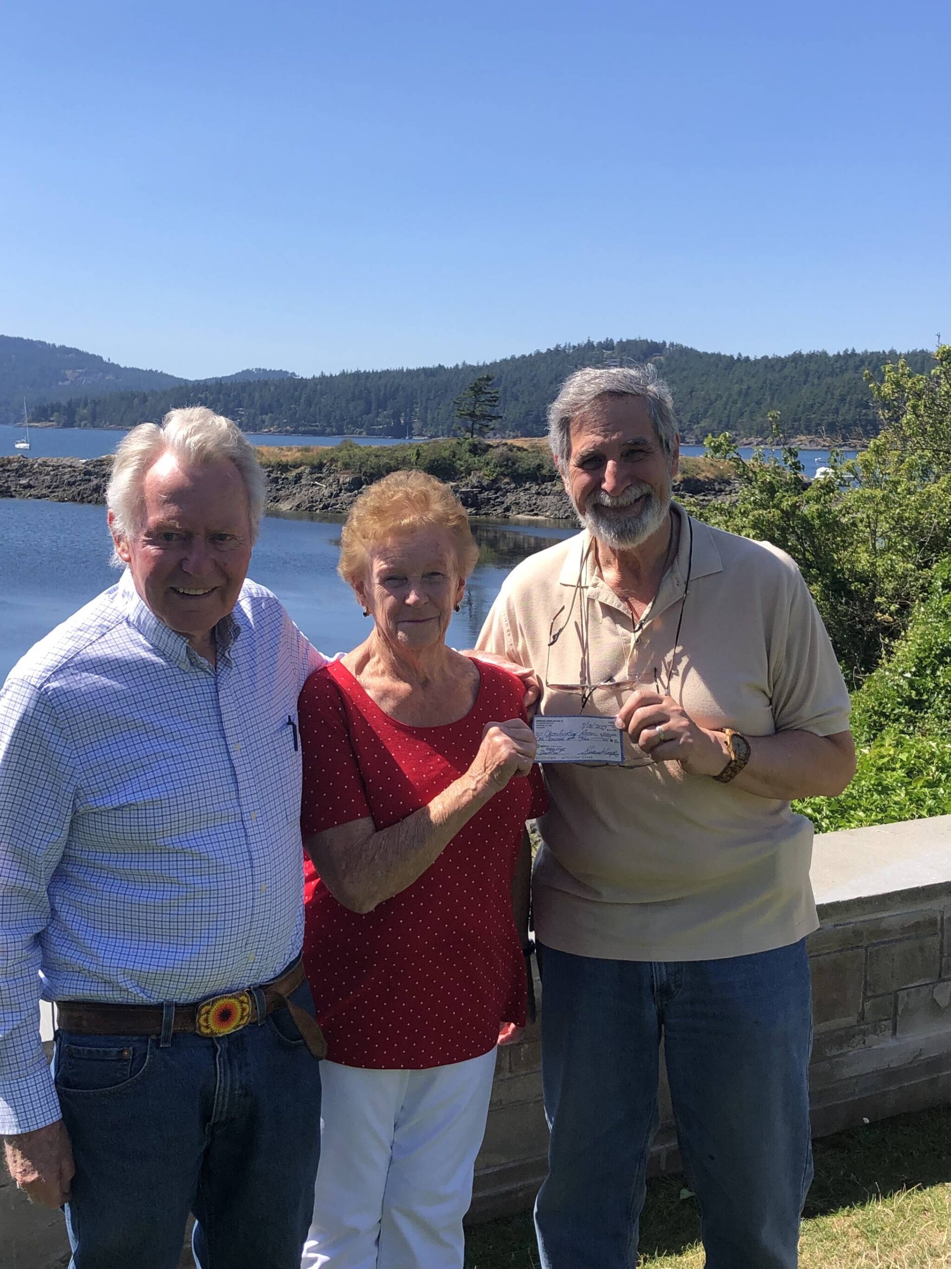 Contributed photo.
L-R: Gill Blinn, pilot in the program, Jan Cleveland, American Legion Auxiliary Chaplain and Jack Becker, Treasurer of the Orcas Aviation Association.