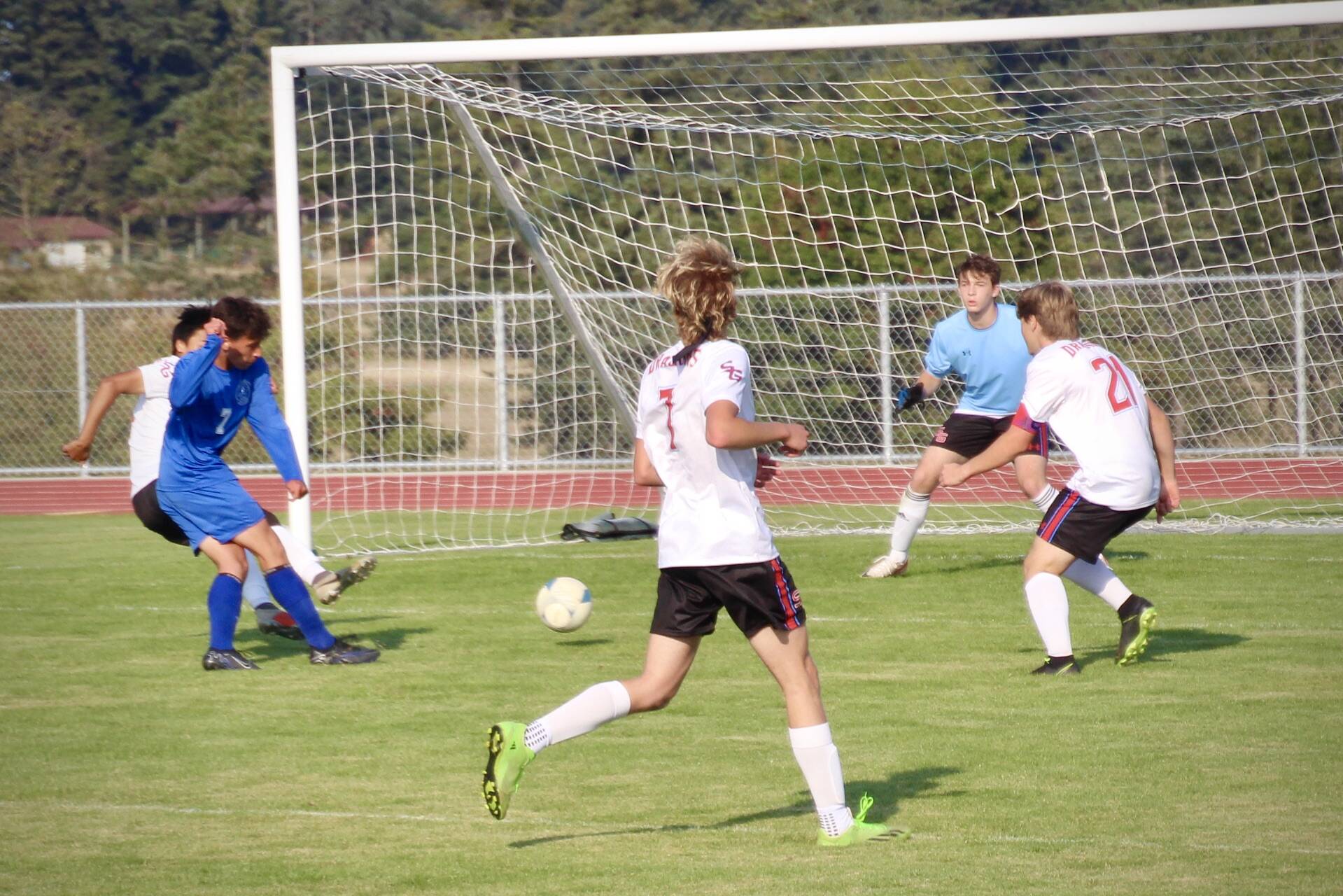 Corey Wiscomb photo.
Joaquin Shanks Morales penetrates the defense and fires a shot to the back of the net.