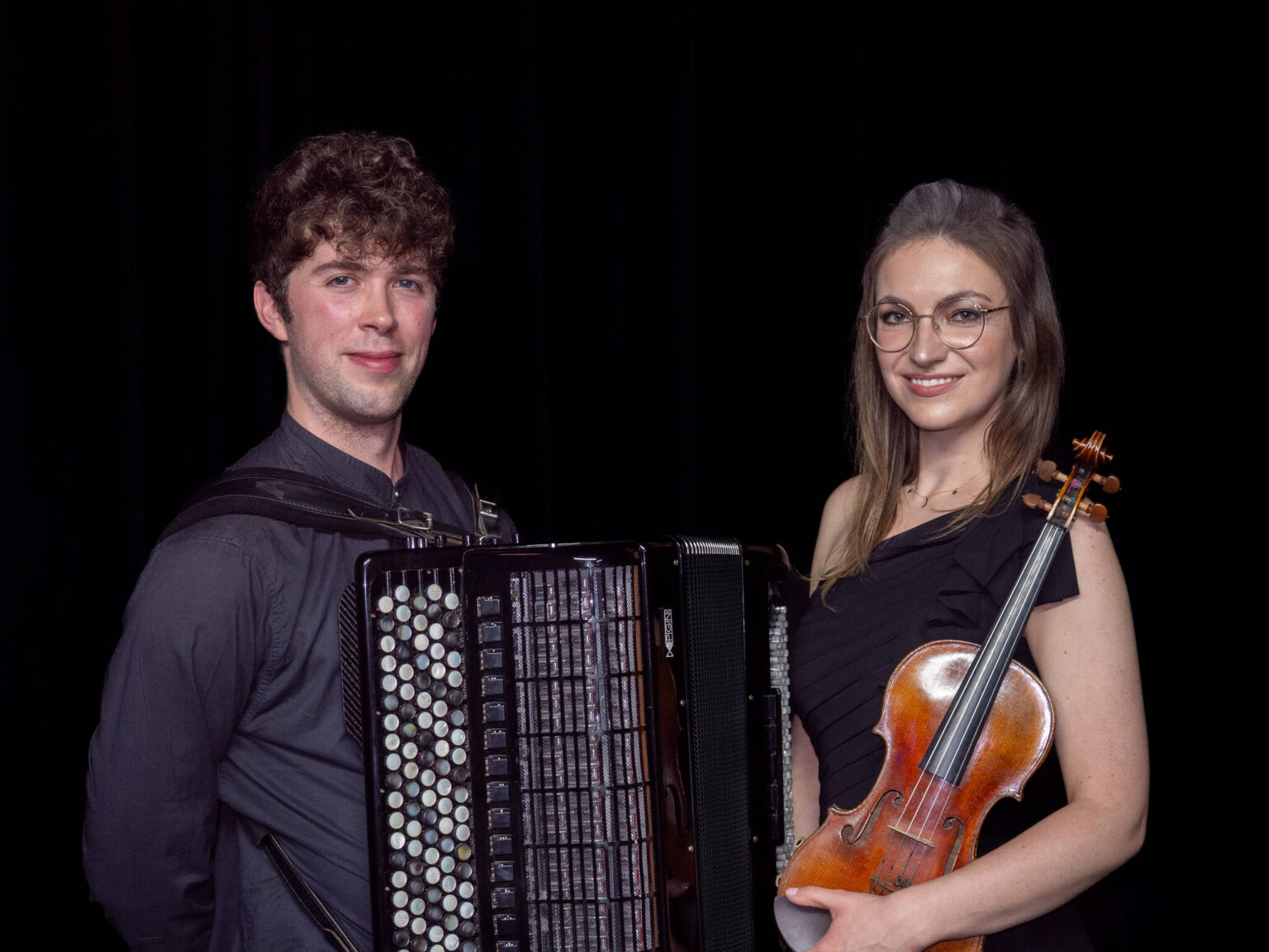 The OICMF violin and accordion duo returns to the islands Islands