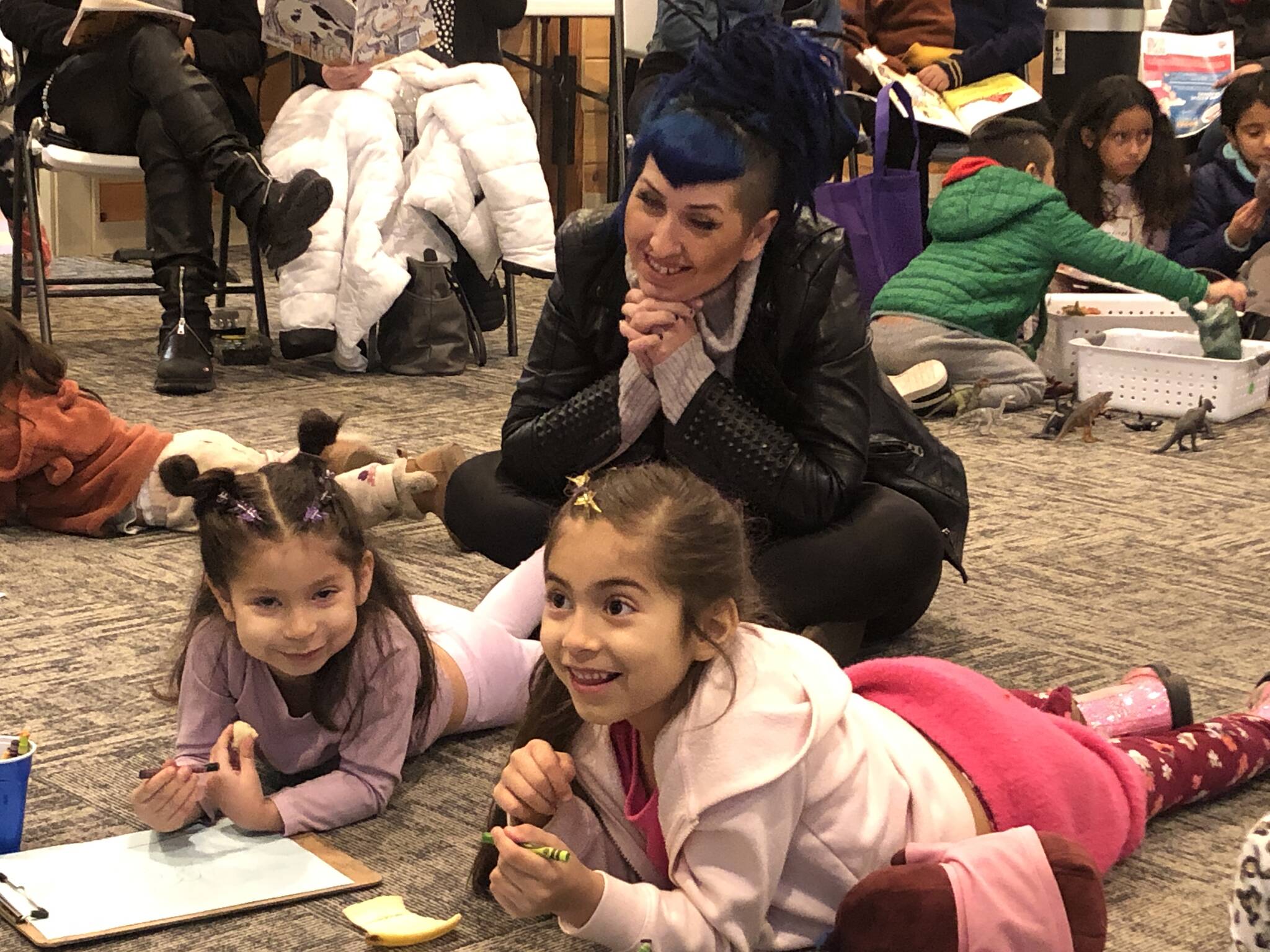 Jenna Moreno with her daughters Vita and Ami (left to right) during the six-week literacy program at the library.
