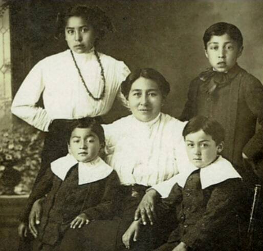 Mary French and her 4 youngest. Left top Vela, left bottom Cornelius (Josiah Frenchs great grandfather), top right John, bottom right Charlie French.