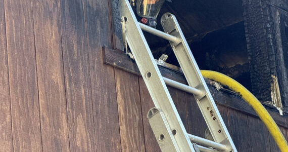 Contributed photo.
Firefighters work to contain the fire.