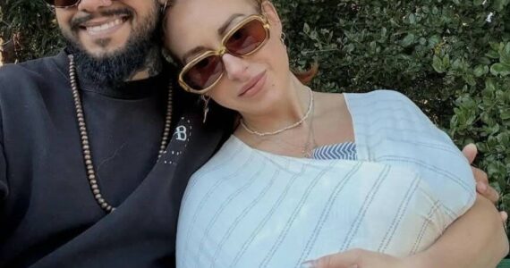 Gui Silva and his wife Rachel Leidig with their newborn.