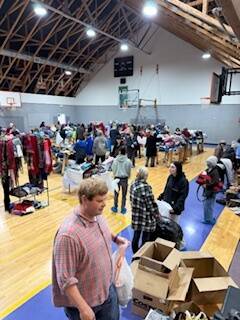 Declan O’Malley photo.
Community members attend the clothing bank event.