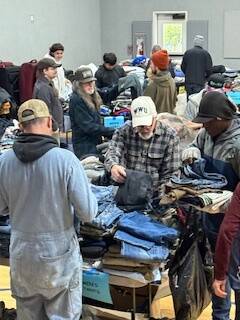 Declan OMalley photo.
Community members attend the clothing bank event.