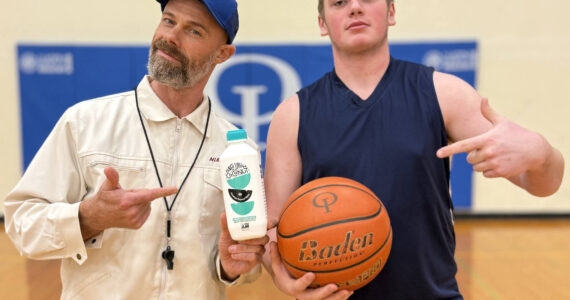 Contributed photo.
Teacher and basketball coach Corey Wiscomb and student Jaxon Paulsen.