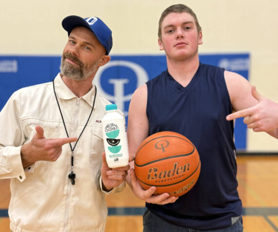 Contributed photo.
Teacher and basketball coach Corey Wiscomb and student Jaxon Paulsen.