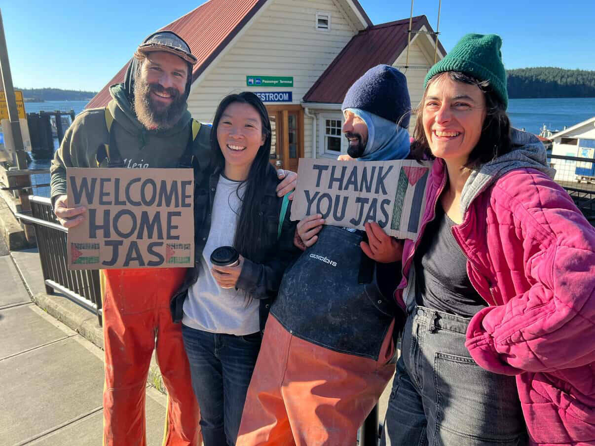 Contributed photo.
Jasmine Ikeda (second from left) was welcomed off the ferry to Orcas Island on Oct. 13 by a crowd of cheering, teary supporters.