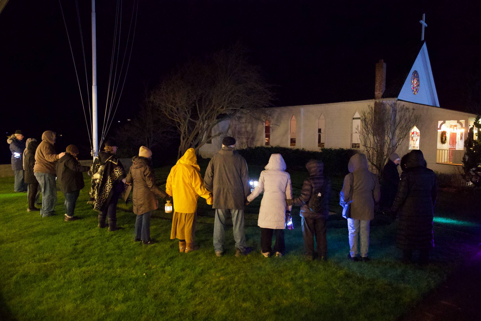Darrell Kirk photo.
Community members take part in a vigil for Renee Good.