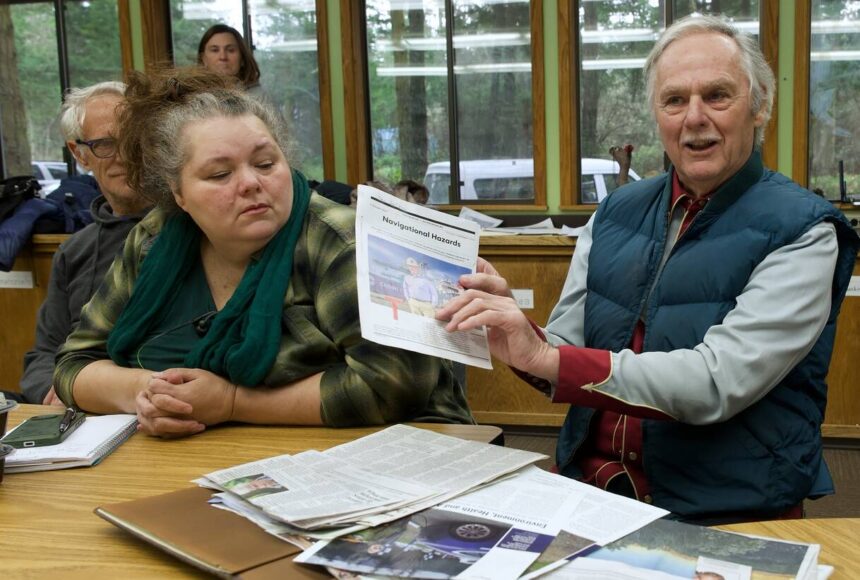 <p>Darrell Kirk Staff photo</p>
                                <p>George Lamb holds up solar research.</p>