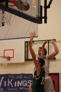 Jake Zier lets fly yet another basket against Darrington during a Friday