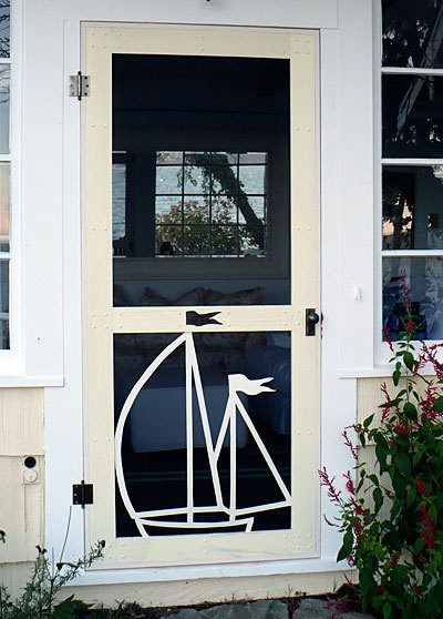 A screen door cut by Bruce Lovejoy.