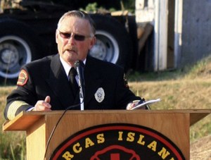 Fire Chief Mike Harris at the department's 9/11 ceremony this year. The search for a new chief is underway.