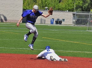Viking Rylan Date (l) in the game against Seattle Lutheran.