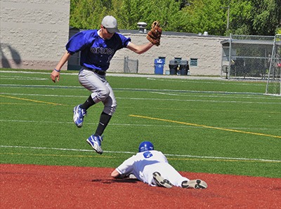 Viking Rylan Date (l) in the game against Seattle Lutheran.