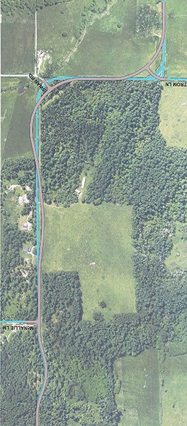 The road in blue represents the existing road and the pink road represents the new option – curvilinear chosen by islanders.