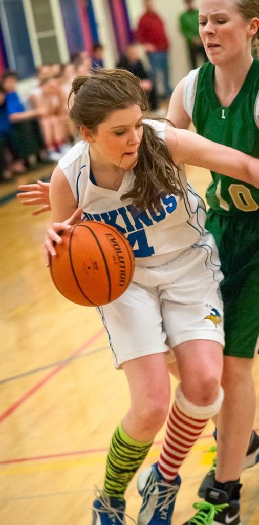 Viking senior Claire O’Neill driving the baseline during the game against Cedar Park Christian on Feb. 3.