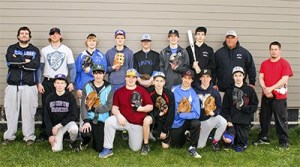 The 2014 boys’ baseball team. Back row: coaches Josh Mayson and James Segault