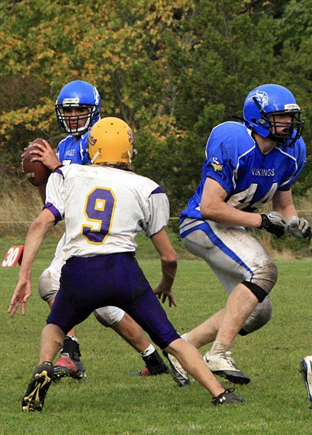 Quarterback Robbie Padbury preparing to pass during the recent game against Concrete.