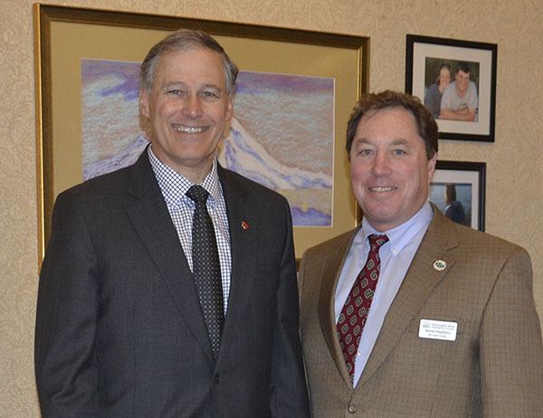Gov. Jay Inslee with council member Jamie Stephens (shown right).