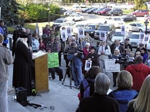 Concerned citizens stood on the Capitol's steps with banners and signs asserting the importance of our ferries.