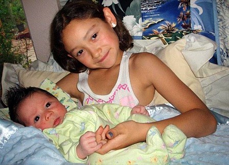 Grant with his big sister Satine.