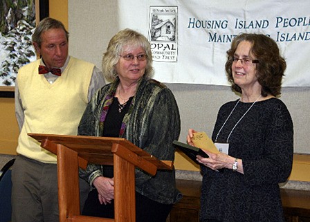 Joe and Kathi Ciskowski were honored as this year’s recipients of the Sky Award for volunteer service that builds and sustains community at OPAL Community Land Trust’s 21st annual meeting. Presenting the award was Penny Sharp Sky