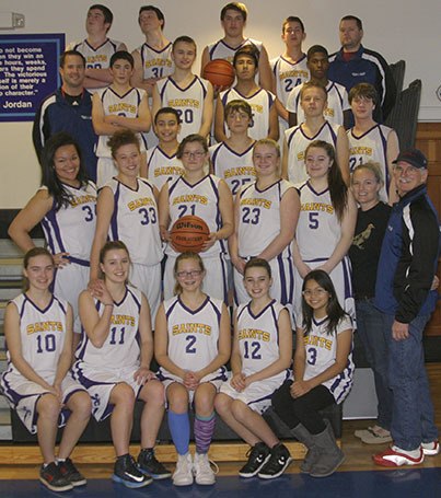 Pictured at right is the Orcas Christian School Saints girls and boys basketball teams. Front row