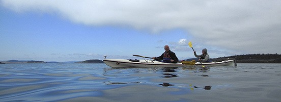 Representative Rick Larsen kayaking at the monument dedication last year.