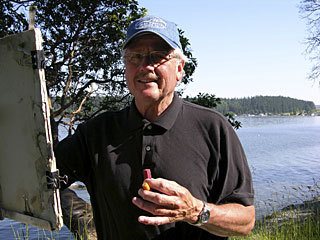 Artist Steve Hill painting “Croatian Island port.”