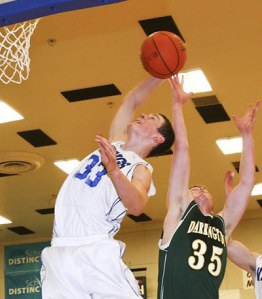 Miles Harlow goes for the shot against Darrington.