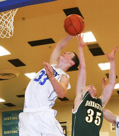 Miles Harlow goes for the shot against Darrington.