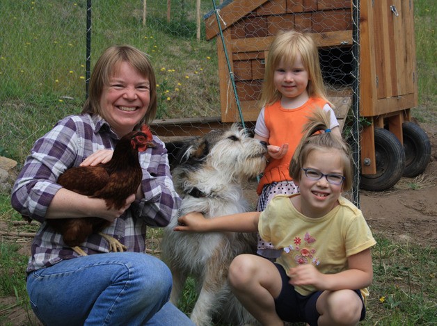 Mandy Troxel with a compliant chicken