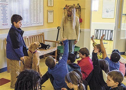Dr. Sally Hodson talks to a group of island youths.