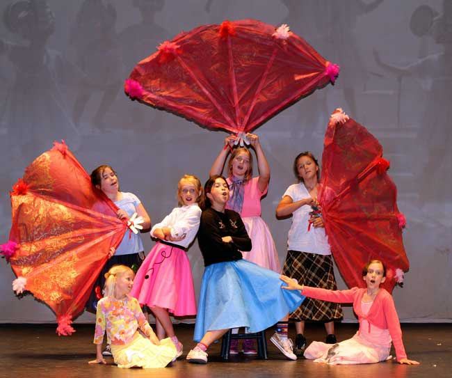 The girls of Grease performing 'Beauty School Drop Out.'