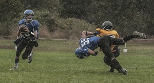 QB Demitri Pence and linebacker Joey Susol (#55) during the Tacoma Baptist game.