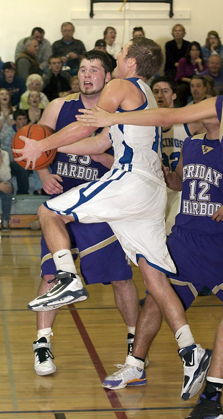 Henri Bredouw (10) slices through the Wolverine's defense. for two more Viking points.