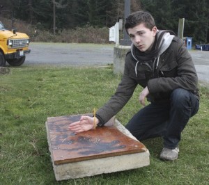 Matthew Bowen explains the complexities of a sundial he and another high school student constructed.