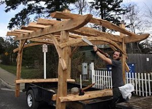 Zacharya Leck puts the finishing touches on his sculpture before its delivery to an Orcas garden.