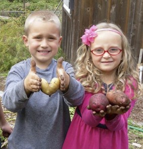 Kids at the Farm to Cafeteria garden