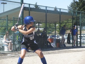 Orcas batter Sydney Harris steps up to the plate.