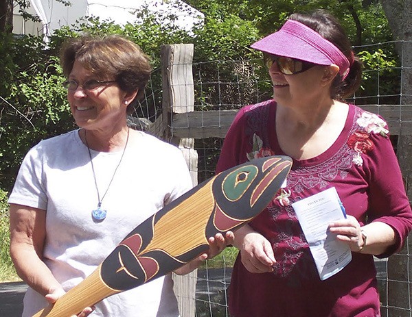 Sydney Exton and Dianna Down with the paddle.