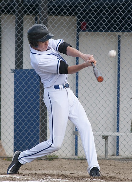 Orcas Viking Gwydion Marreth hitting the ball.
