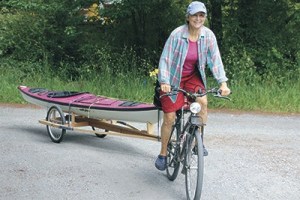 Orcas Islander Cathy Ellis takes her new kayak trailer for a ride.