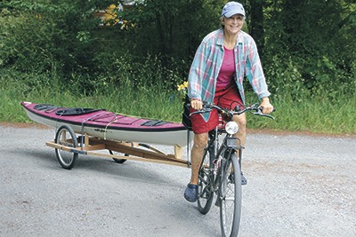 Orcas Islander Cathy Ellis takes her new kayak trailer for a ride.