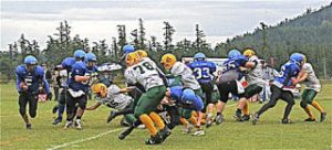 Tyler Nigretto carries the ball for Orcas
