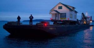 Kunkel Moving and Raising bringing the house onto North Beach.